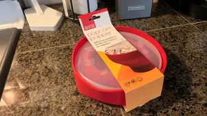 Rapid Brands silicone microwave popcorn popper bowl with lid in new package.